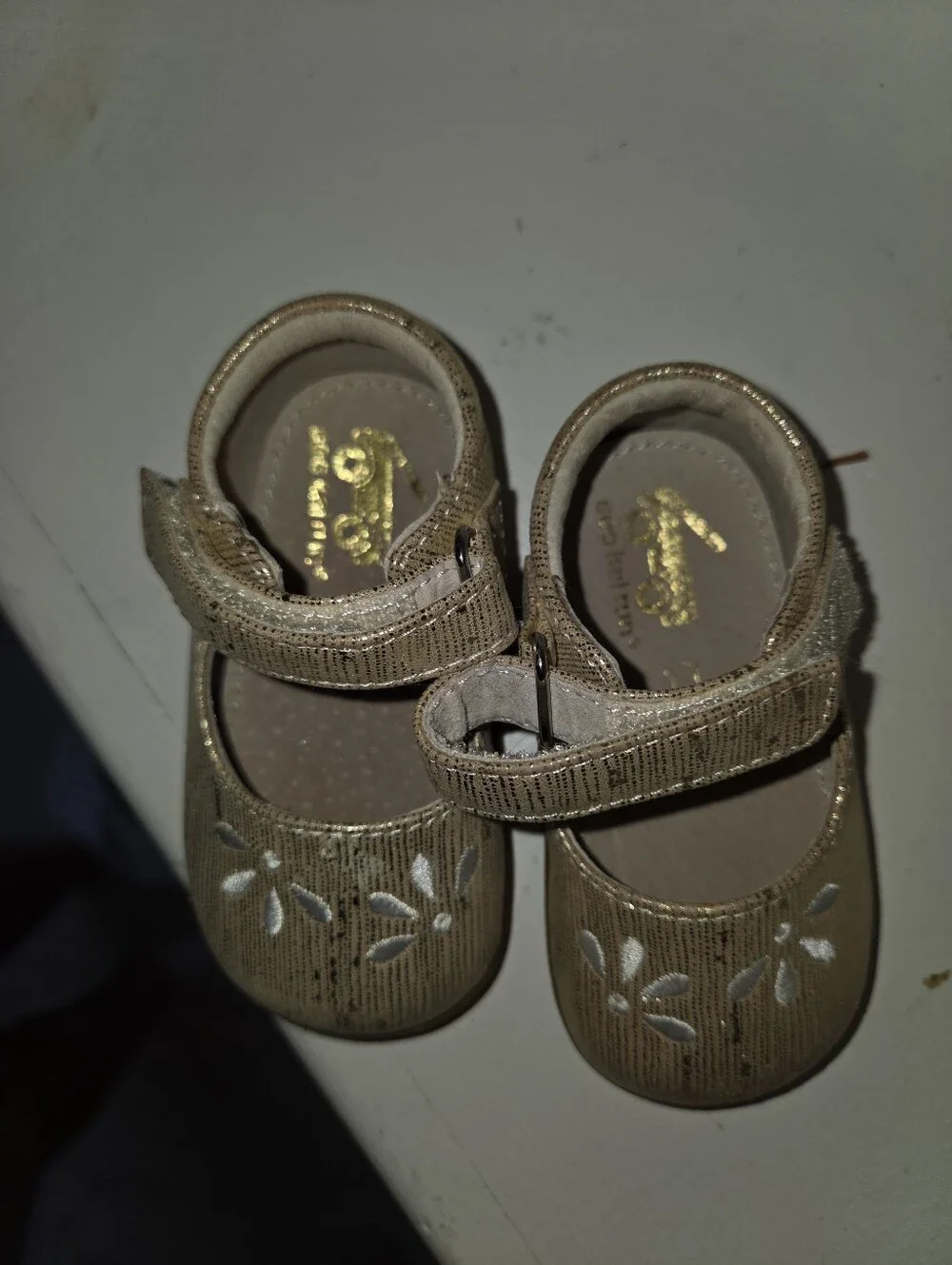 See Kai Run Metallic Gold Mary Janes with White Floral Accent